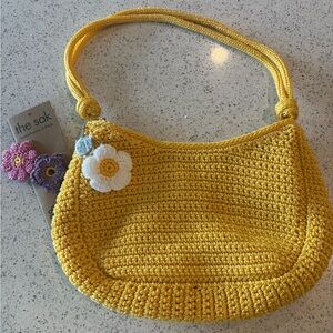 The Sak Yellow Crochet Shoulder Bag with Floral Charms